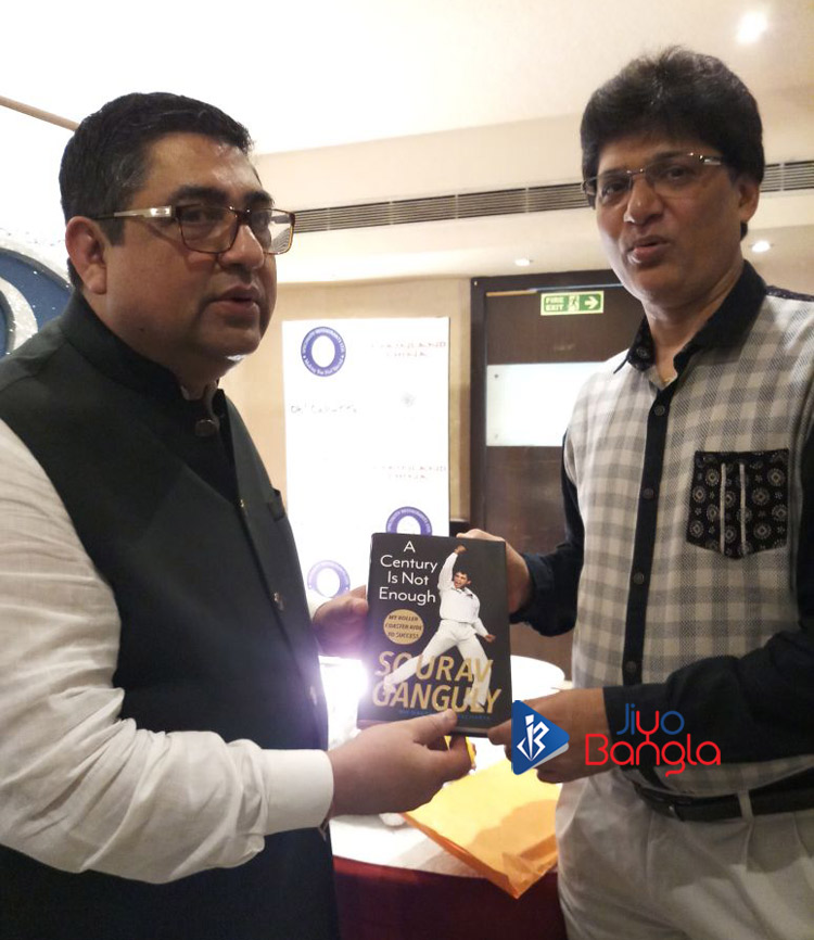 Gautam Bhattacharya gifting his new book to Anjan Chatterjee