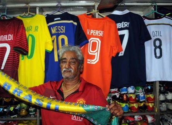 Fans of FIFA under-17 Football World Cup swarm outside Maidan Market for team jersey