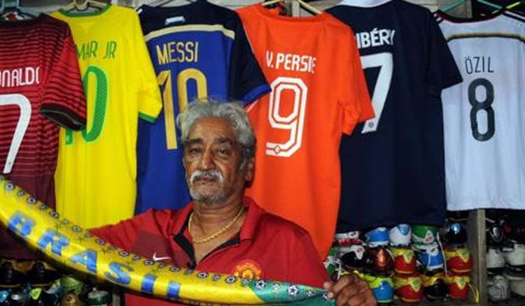 Fans of FIFA under-17 Football World Cup swarm outside Maidan Market for team jersey