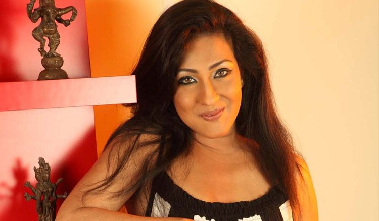 Rituparna Sengupta in “Aamar Bhoy” by Mohua Chakraborty