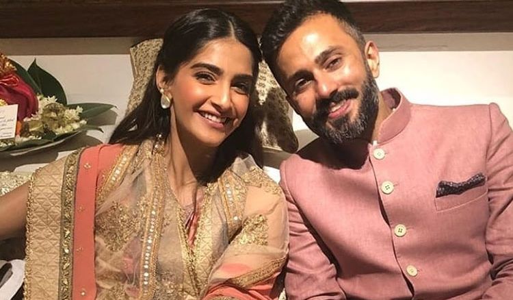 Sonam and Ahuja finally revealed their wedding card.