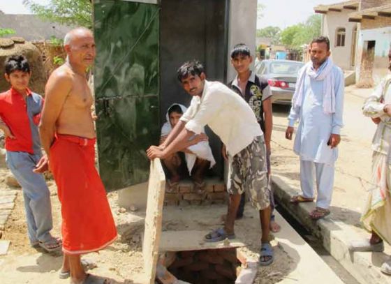 Villagers build toilets in three days