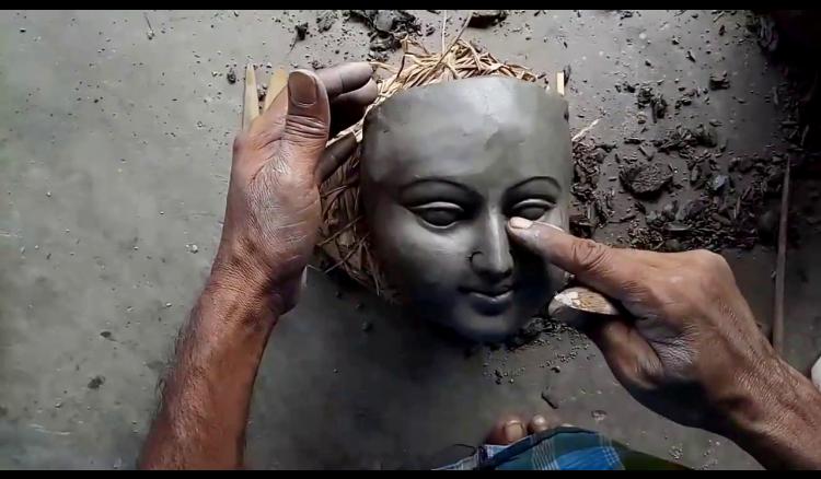 the mask of Durga